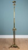 A Neoclassical-style brass lamp standard