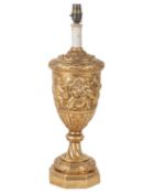 A gold-painted table lamp