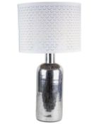 A mirrored glass table lamp