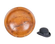 A turned bowl and a small bowler hat
