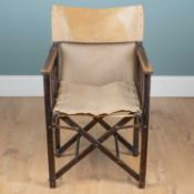 An Arts & Crafts-style campaign chair