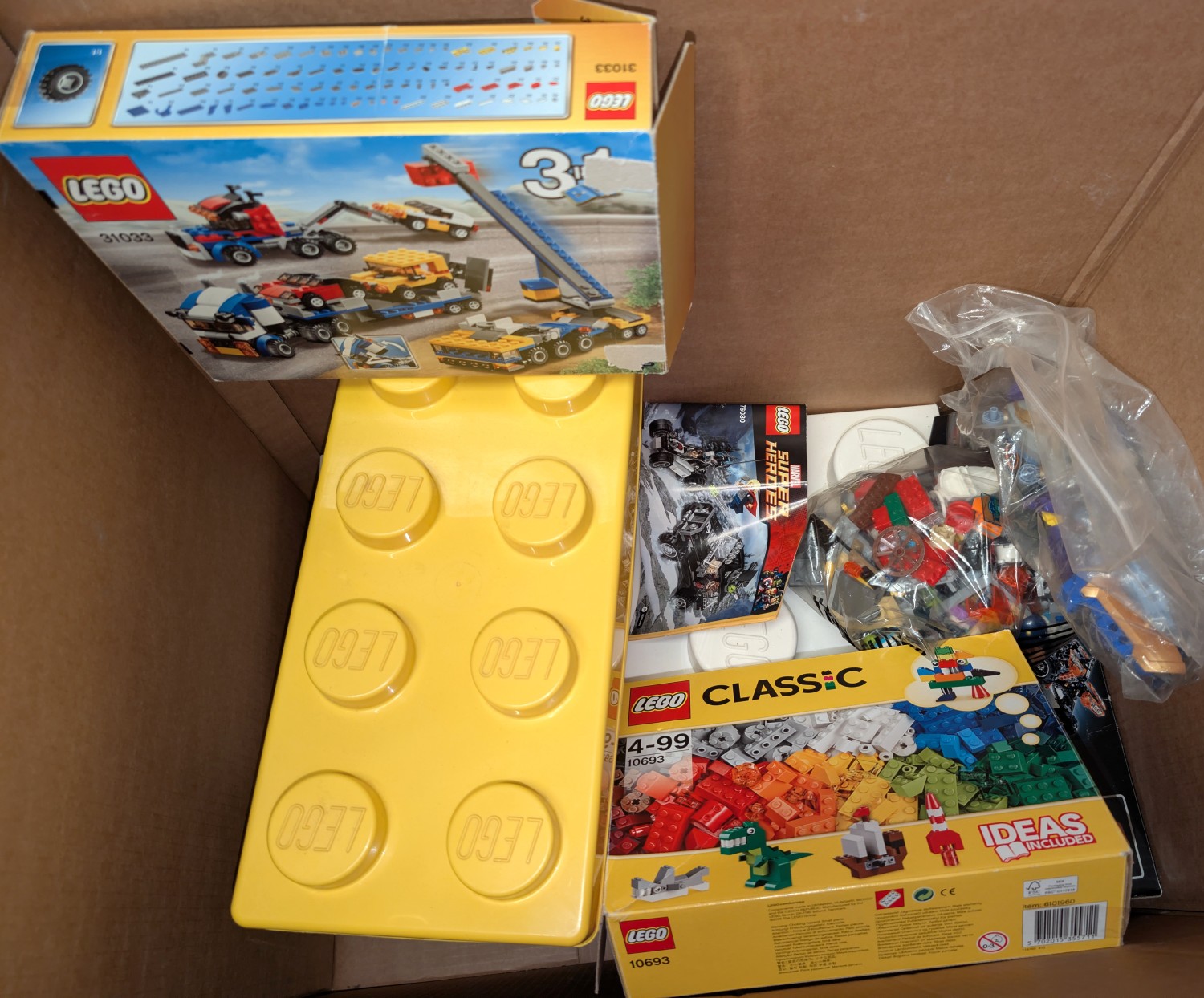 A collection of boxed and loose Lego