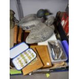 A large selection of fly tying feathers etc. and fly fishing equipment.