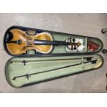A 19th century violin with case and 2 bows.