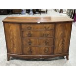 A mahogany bow fronted sideboard on bracket feet. 52' wide