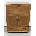 An Ercol Windsor model 469 elm serving or drinks cabinet. 32in wide x 43in high