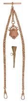 A 9ct gold Albert, with 'T'-bar and 9ct gold shield, 38cm l, links individually marked, 34.2g and