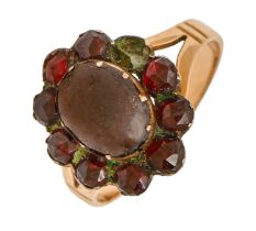 A garnet ring, the cluster on associated gold hoop, marked 15ct, 3.9g, size O One stone deficient