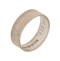 An 18ct white gold wedding ring, London 1971, 3.6g, size J Slight wear
