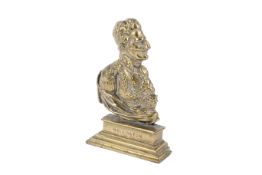A brass door stop modelled as the Duke of Wellington.