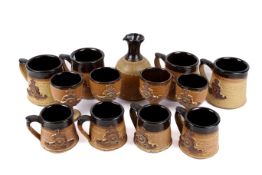 A set of Royal Artillery stoneware drinking vessels.