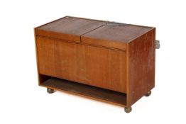 A mid-century teak cased radiogram. Having a Garrard turntable and Quad radio.