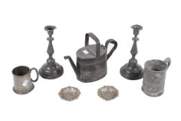 A collection of seven assorted pewter items.
