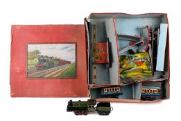 A Fischer for British Market 0 gauge clockwork train set.