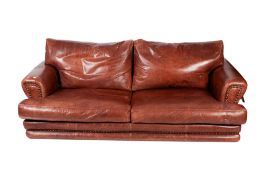 A large brown leather sofa.