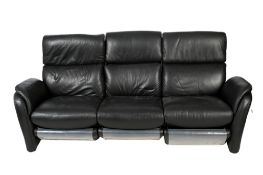 A W. Schillig black leather three-seater sofa.