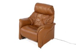 A Himolla Chester 'rise and recline' electric armchair.
