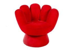 A Retro Pop Art-style 'hand' chair with red velour/suede upholstery.