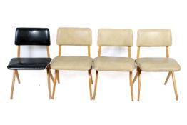 A set of four mid-century Kandya vinyl kitchen chairs.