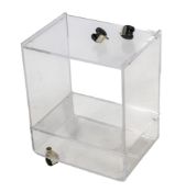 A perspex side table on castors.