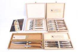 Four Le Laguiole C. Lacaze boxed flatware sets and a book.