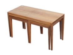 A vintage nest of table and a teak standard lamp.