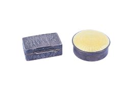 Two silver and white metal boxes.