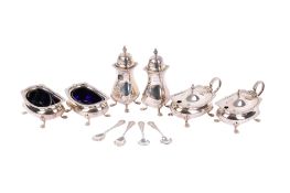 An Elizabeth II silver eight piece matching condiment set.
