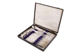 A set of six silver handled fish knives and forks with servers.