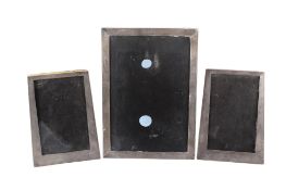A set of three 20th Art Deco silver photograph frames.