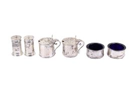 A six-piece silver cruet set.