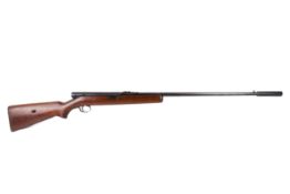 A Winchester Mod 74 .22 CAL rifle. (Short) iron sights, no scope with sound modifier, s/n. 77503.