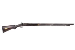 A Single barrel percussion shotgun.