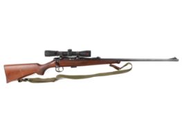 A Brno Mod 2 bolt action .22 rifle with Redfield 2-7x40 scope. Circa 1960. S/N 109117.