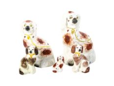 Group of five Staffordshire pottery King Charles spaniels. Max.