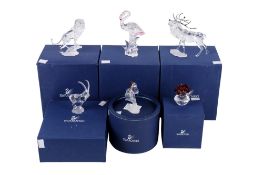 Collection of six assorted Swarovski Crystal glass ornaments.