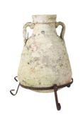 Antique classical terracotta urn on stand. Of tapering form and having two handles to the neck.