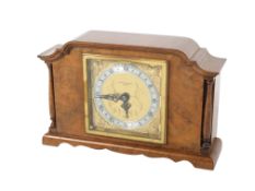 An Elliott Clock walnut cased mantel clock, Mappin & Webb Ltd.