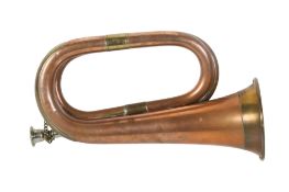 Copper and brass bugle with mouth piece.