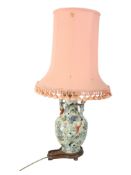 Chinese 'climbing children' ceramic table lamp (AF).