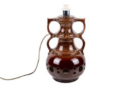 A retro brown 'fat lava' twin handle ceramic table lamp.