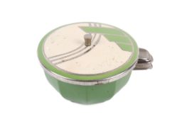 An Art Deco set of four enamel ashtrays in lidded container. Each of a different colour, unbranded.