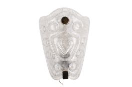 A contemporary pressed glass wall light. Of shield form decorated with embossed roundels.