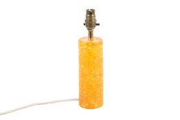 A 1960s period orange resin Shatterline cylindrical table lamp. Height of orange base 19cm.