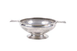An Arts and Crafts twin-handled silver dish.