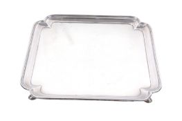 A large square silver salver.