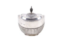 A Victorian silver lidded sugar pot.