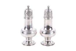 Two late Victorian silver shakers.
