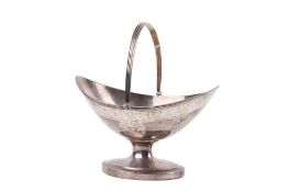 A George III silver swing handled bonbon basket.