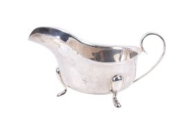 A silver sauce boat.